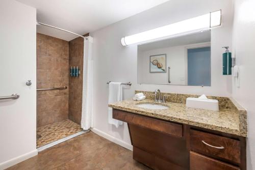 a bathroom with a sink and a shower at Hilton Vacation Club Daytona Beach Regency in Daytona Beach