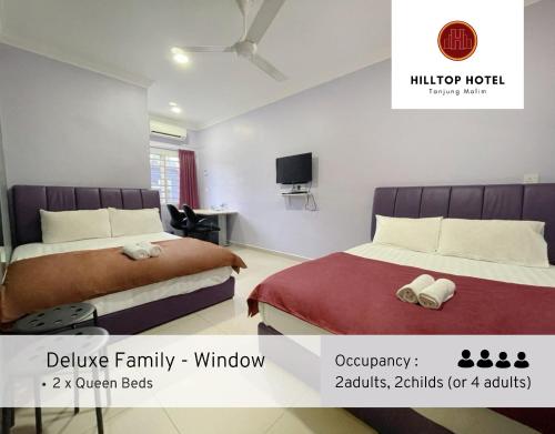 Postel nebo postele na pokoji v ubytování Hilltop Hotel Tanjung Malim