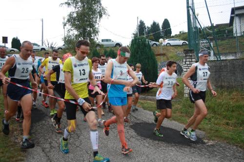 a group of people running a race at Albergo Diffuso Faller in Faller