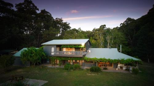 a house with a green roof with plants on it at Yarradene Luxury Healesville Farmstay in Healesville