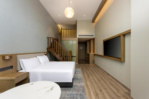 Posezení v ubytování Holiday Inn Jiuhua Mountain Hot Spring by IHG