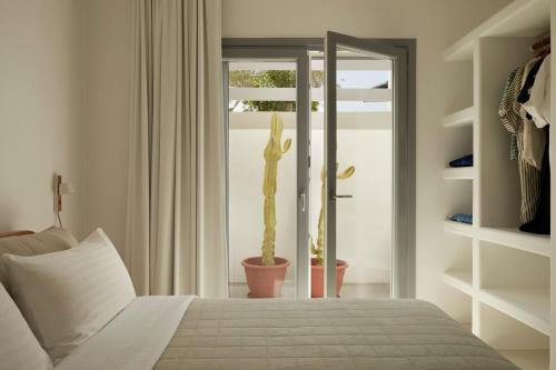 Katil atau katil-katil dalam bilik di Isychos House - Tranquil Oasis