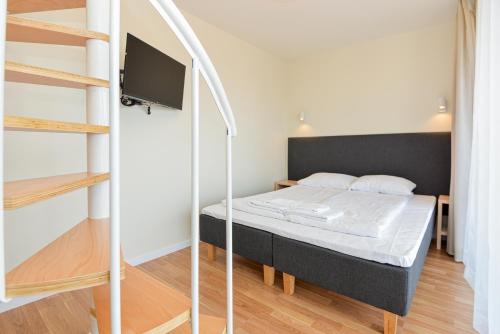 Postel nebo postele na pokoji v ubytování Liepų 16