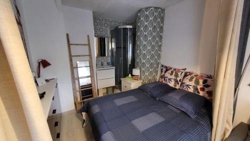 Postel nebo postele na pokoji v ubytování Le Laurier Rose