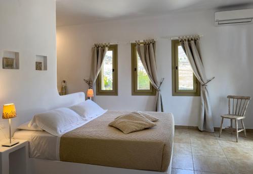 Postel nebo postele na pokoji v ubytování Lithia Villas