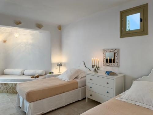 Postel nebo postele na pokoji v ubytování Lithia Villas