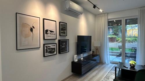 TV a/nebo společenská místnost v ubytování LemonNing Condo