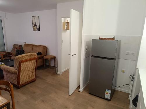 Η κουζίνα ή μικρή κουζίνα στο Bel appartement disponible