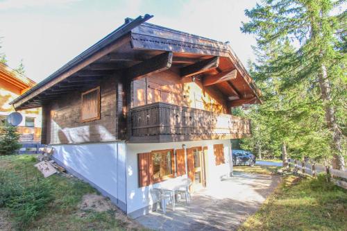 a house with a balcony on top of it at Hochkrimml 51 - Top EG in Unterkrimml