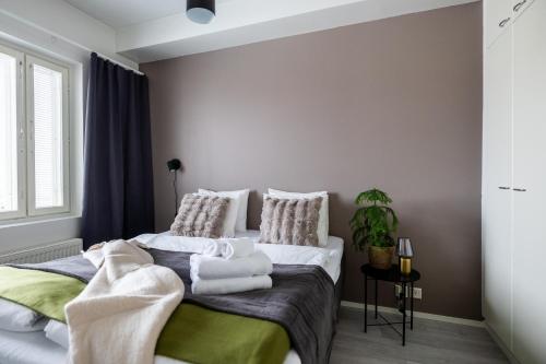 Postel nebo postele na pokoji v ubytování Arctic Mellow City Suite