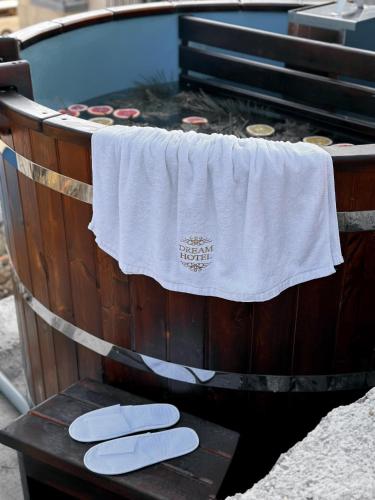 a towel is hanging on the side of a grill at Dream Hotel in Haghpat