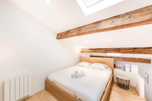 Posteľ alebo postele v izbe v ubytovaní Loft mezzanine vue incroyable Saône