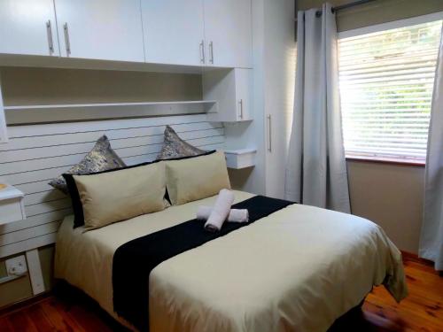 Postel nebo postele na pokoji v ubytování Boitumelo Holiday Home