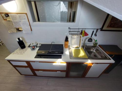 Una cocina o zona de cocina en Nido di Stella