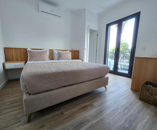 Postel nebo postele na pokoji v ubytování S A L - Beach Apartments Caniçal