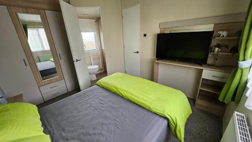 Ένα ή περισσότερα κρεβάτια σε δωμάτιο στο Pura Vida Caravan