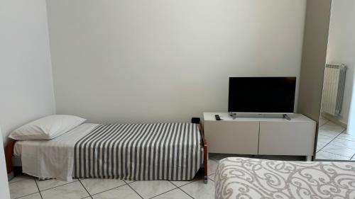 Postel nebo postele na pokoji v ubytování B&B Eracle