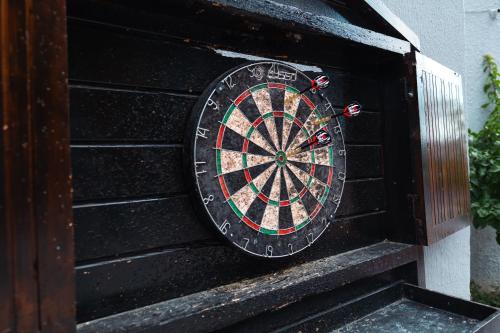 a dart board on the side of a wall at Scylax Hotels Mahmutlar in Alanya