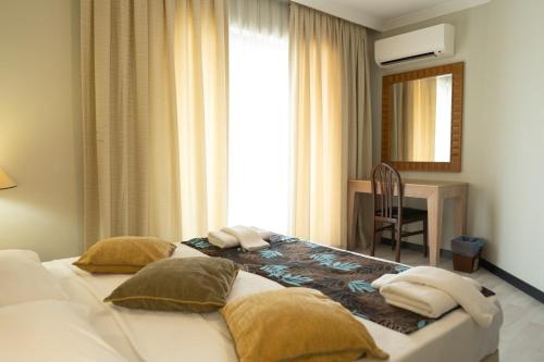 Postel nebo postele na pokoji v ubytování Scylax Hotels Mahmutlar