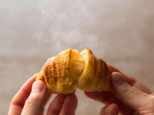 a person is holding a piece of food at Mercure Kochi Tosa Resort & Spa in Geisei