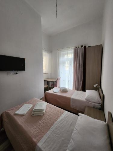 Postel nebo postele na pokoji v ubytování Casa Roxana