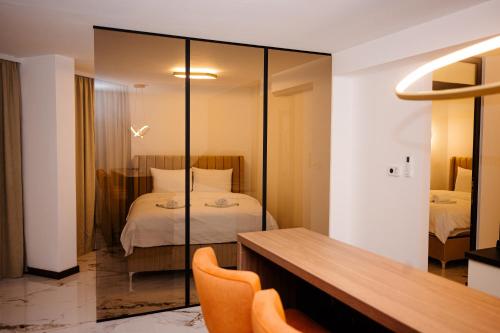 Ένα ή περισσότερα κρεβάτια σε δωμάτιο στο Apartmani VIZIJA