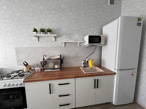 Cuina o zona de cuina de Жана Кала