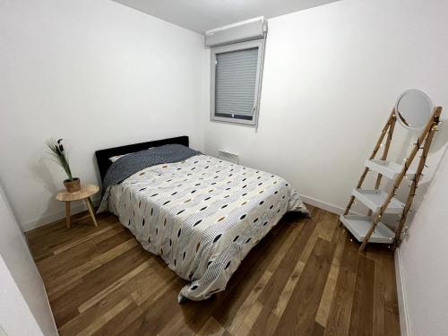 Giường trong phòng chung tại Le Félicità- T2 - Parking - Piscine