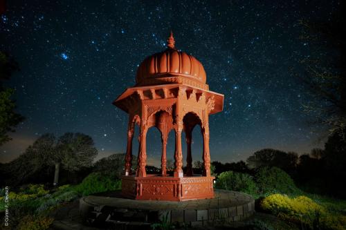 a gazebo at night under a starry sky at Kamala Kutir in Somogyvámos