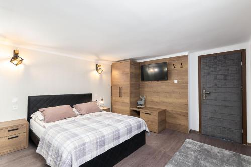 Postel nebo postele na pokoji v ubytování Villa Platinum