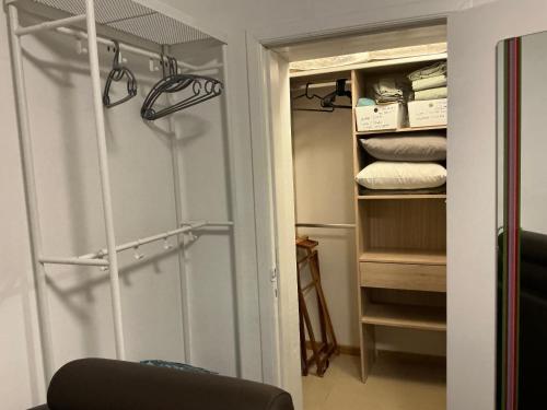 a room with a closet with some towels at Aura Diest in Diest