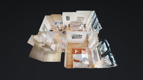 - une vue de tête sur un petit appartement avec plan d'étage dans l'établissement 311 Suite Elisa - Superbe Appartement à Paris., à Paris