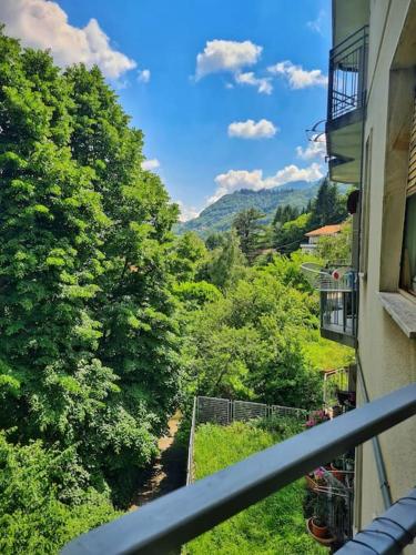 a balcony of a building with a view of a valley at Il Posticino DI Bellagio in Civenna