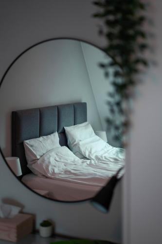 Postel nebo postele na pokoji v ubytování Wąska 5 Apartamenty