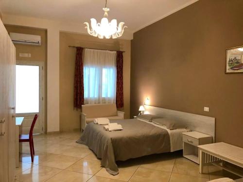 Postel nebo postele na pokoji v ubytování Hotel Borina by Isola dei sapori