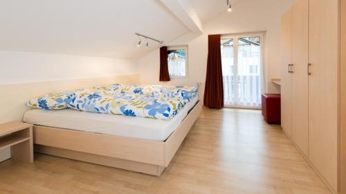 Postel nebo postele na pokoji v ubytování Chalet Alpenrösli