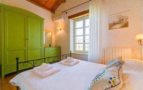 Ένα ή περισσότερα κρεβάτια σε δωμάτιο στο Villa Casa Bella