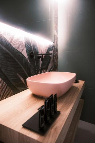 a bathroom with a bowl sink on a counter at Relais Ena in Gallipoli