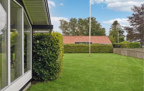 a view of a yard from a house at 2 Bedroom Stunning Home In Odder in Odder