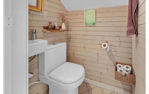 a bathroom with a toilet and a sink at Cozy Home In Gørlev With House Sea View in Gørlev