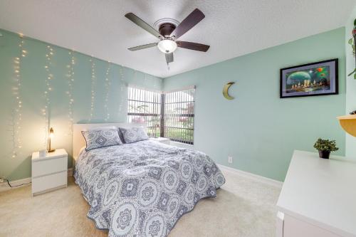 a bedroom with a bed and a ceiling fan at Riverfront Backyard and Grill Sunrise Family Home in Sunrise