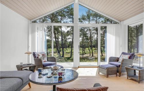Posezení v ubytování Three-Bedroom Holiday Home In Nexo