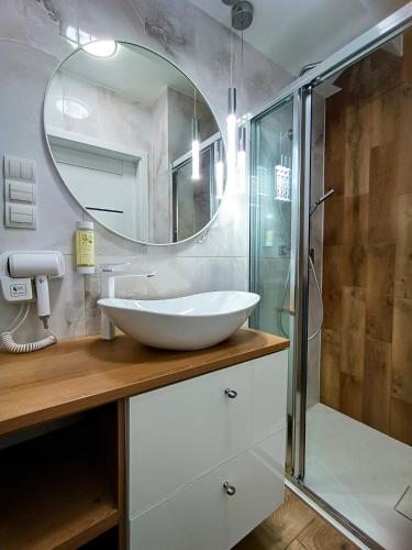 Ένα μπάνιο στο AmaMolto Select - włoskie apartamenty, bezpłatny parking