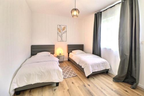 Alsace Appartement à Colmar climatisée garage, parking et terrasse