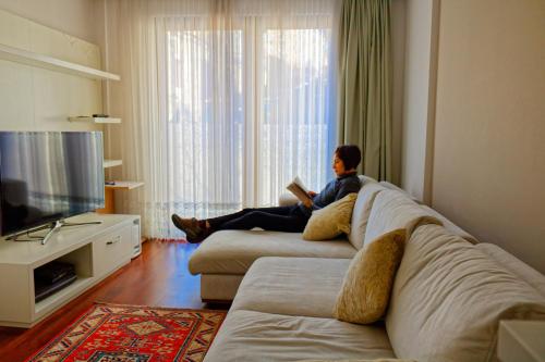 Ada Hotel Istanbulにあるテレビまたはエンターテインメントセンター