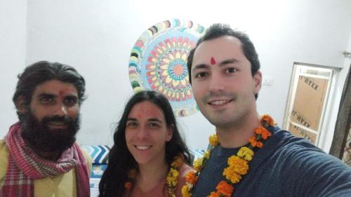 a group of three people posing for a picture at Maji Homestay Khajuraho in Khajurāho