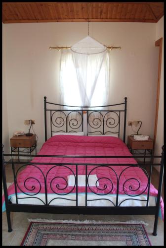 Postel nebo postele na pokoji v ubytování Guesthouse Xenioti