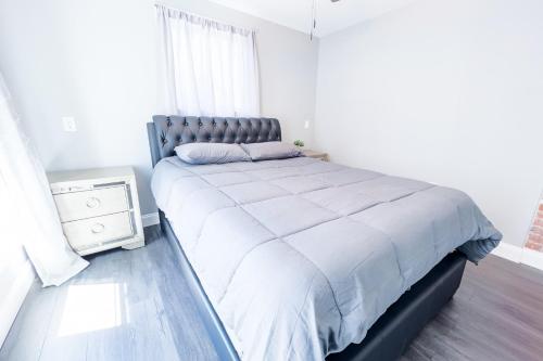 Postel nebo postele na pokoji v ubytování Modern 5BR Home Perfect for Families