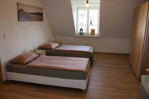 Hotel Kreuz Renchenにあるベッド
