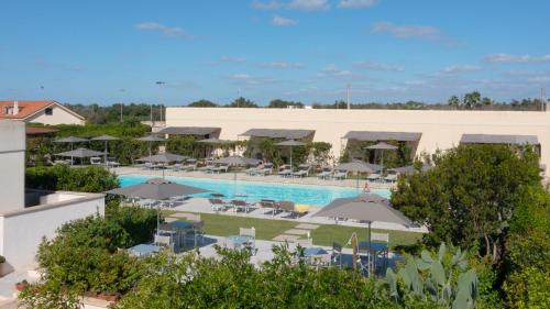 a view of the pool at a resort at Delle Rose Horses Club in Torre Vado